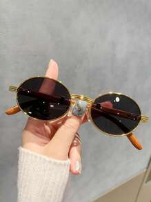 全新复古椭圆形镜框时尚眼镜，采用仿木纹镜腿设计，椭圆形镜框