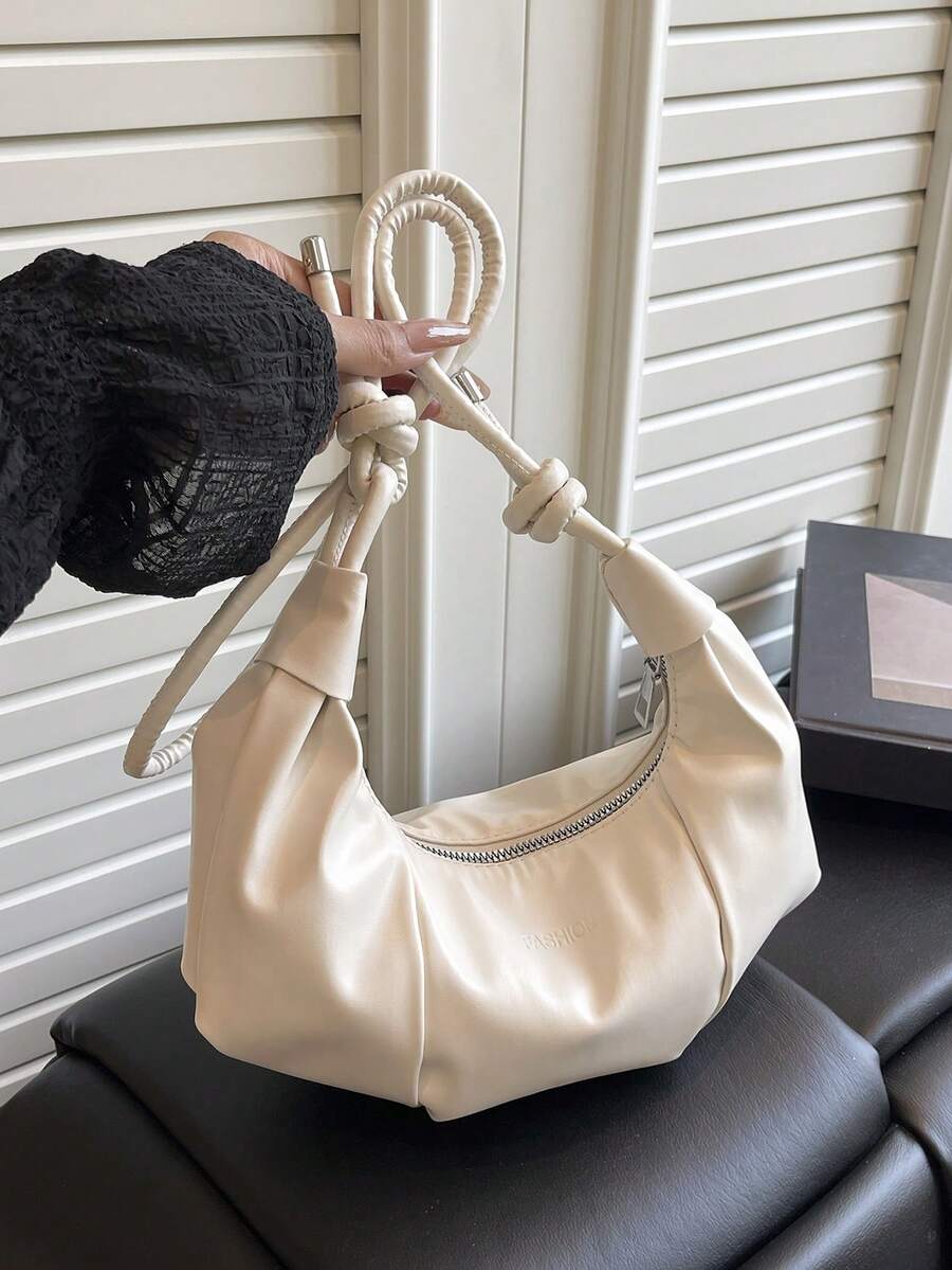 休闲通勤饺子设计钱包，女士新款时尚百搭单肩包，带褶皱休闲感和吊坠