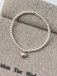 1 件优雅纯银心形珍珠手链，适合女性日常佩戴