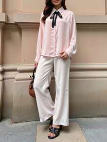女式春夏时尚休闲法式设计蝴蝶结点缀缎面长袖衬衫