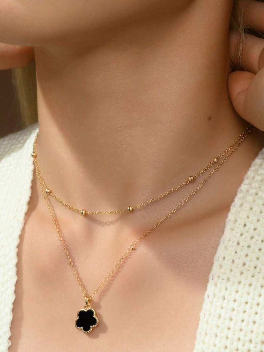1 件时尚经典幸运五叶草吊坠多层项链，适合女士（第一层珠子数量随机，部分黑色珠子需要剥落） - 雙層黑色小花項鍊 - 查看 1