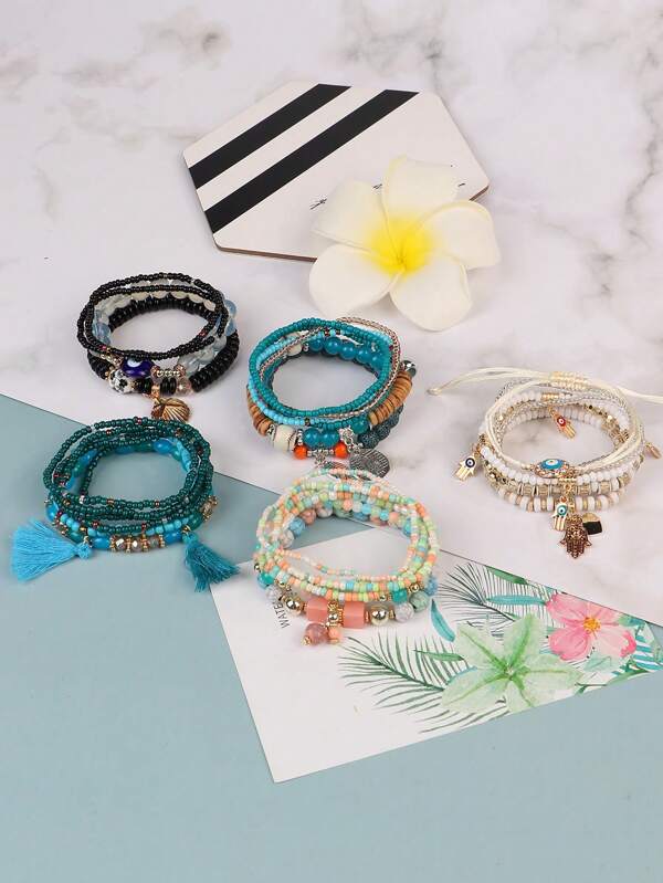 Set de 28 piezas Pulsera bohemia de varias capas con cuentas, colgante de flecos, hecha a mano con cuerda elástica, joyas ajustables, para uso diario de las damas, fotos en la playa, regalo de cumpleaños