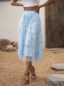 Falda midi de tul azul con bordado floral 3D y detalles dorados. Diseño romántico y vaporoso, ideal para primavera y verano, eventos o un look dulce y femenino.  Floral  Estampado Integral  Hoja    Elegante  Bohemio    Poliéster    Bordado  Nudo  Gasa    Playa  Noche de fiesta  Vacaciones  Boda  Fiesta de Cumpleaños  Jardín  Sesión de fotos  Calle  viaje    primavera y verano - Azul - Ver 3