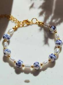 1 pièce Magnifique et délicat bracelet en céramique avec perles dorées et perles baroques artificielles, avec Vierge Marie et pendentif en acier inoxydable. Un excellent cadeau/bijou chrétien/cadeau chrétien