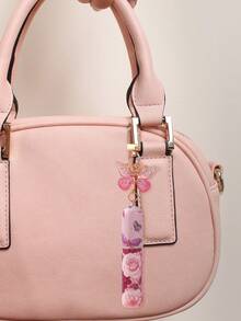 1个5毫升香水瓶，钥匙扣包蝴蝶香水补充瓶，便携式旅行底部补充瓶，可重复使用的香水补充瓶，液体补充瓶。喷雾瓶。喷雾细腻，纳米喷嘴方便携带。香水瓶，独立香水瓶。旅行必备品，假期香水补充瓶，旅行瓶