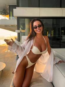 时尚复古小框椭圆形眼镜，男女通用，亮黑色镜框，灰色或橙色镜片可选，是适合各种场合的时尚配饰。椭圆形墨镜