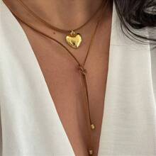 COLAR CHOKER CORAÇÃO DOURADO- ESTILO BOHO  AJUSTE EM CAMURÇA MARROM OU PRETO-envio aleatorio