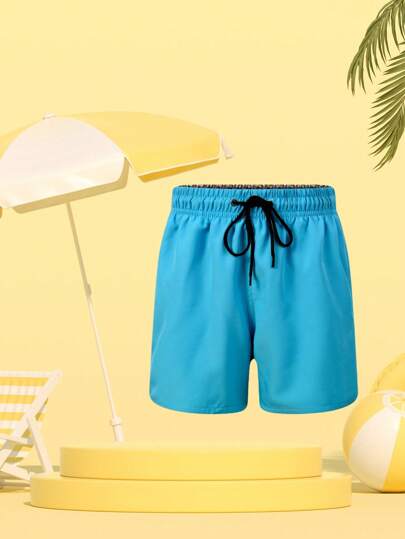 Boy Solid Color Drawstring Waist Swim Trunks