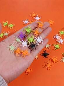 100 件万圣节彩色仿真蜘蛛，逼真的假迷你蜘蛛，随机颜色的小蜘蛛，生动逼真的塑料小蜘蛛，万圣节主题派对装饰，桌面装饰，生日派对，万圣节恐怖礼物，房屋蜘蛛装饰，房间装饰，花园装饰，庭院装饰，节日装饰，蛋糕装饰