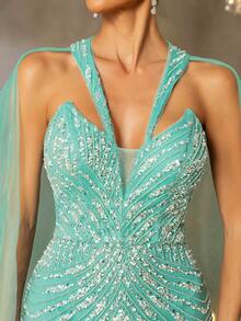 Vestido de noche de lujo Faeriesty con cuello halter y capa de tul transparente | Elegante vestido formal de silueta de sirena con apliques bordados y cola dramática | Vestimenta formal para alfombra roja, bodas de etiqueta negra, ceremonias de premios, bailes benéficos - Verde - Ver 7