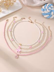 Set de 4 collares con mariposas y flores de perlas y cuentas para niñas