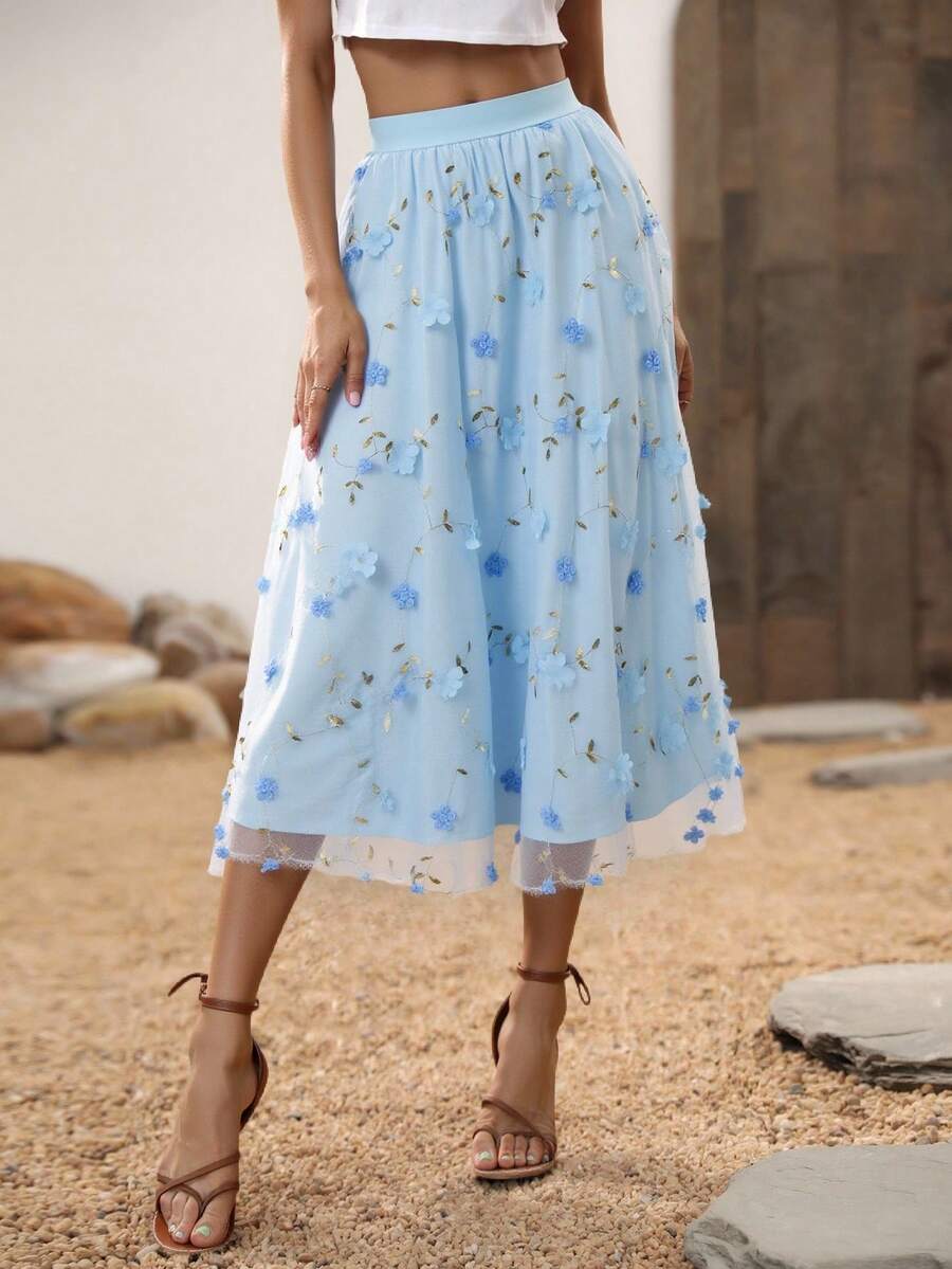 Falda midi de tul azul con bordado floral 3D y detalles dorados. Diseño romántico y vaporoso, ideal para primavera y verano, eventos o un look dulce y femenino.  Floral  Estampado Integral  Hoja    Elegante  Bohemio    Poliéster    Bordado  Nudo  Gasa    Playa  Noche de fiesta  Vacaciones  Boda  Fiesta de Cumpleaños  Jardín  Sesión de fotos  Calle  viaje    primavera y verano - Azul - Ver 1