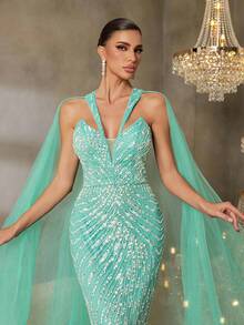 Vestido de noche de lujo Faeriesty con cuello halter y capa de tul transparente | Elegante vestido formal de silueta de sirena con apliques bordados y cola dramática | Vestimenta formal para alfombra roja, bodas de etiqueta negra, ceremonias de premios, bailes benéficos - Verde - Ver 6