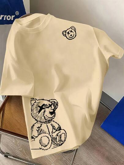 Camiseta de cuello redondo de manga corta con diseño casual de oso y diseño simétrico para jóvenes. Los bolsillos están hechos de tejido de punto microelástico, adecuado para primavera y verano.