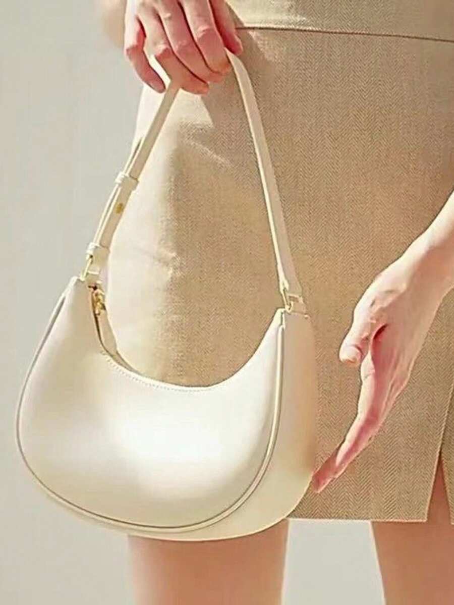 女士腋下包、独特设计法棍包、百搭新时尚