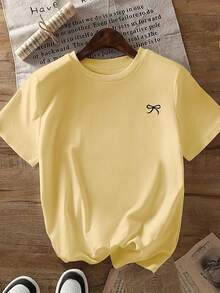 T-shirt ample à manches courtes avec imprimé nœud papillon