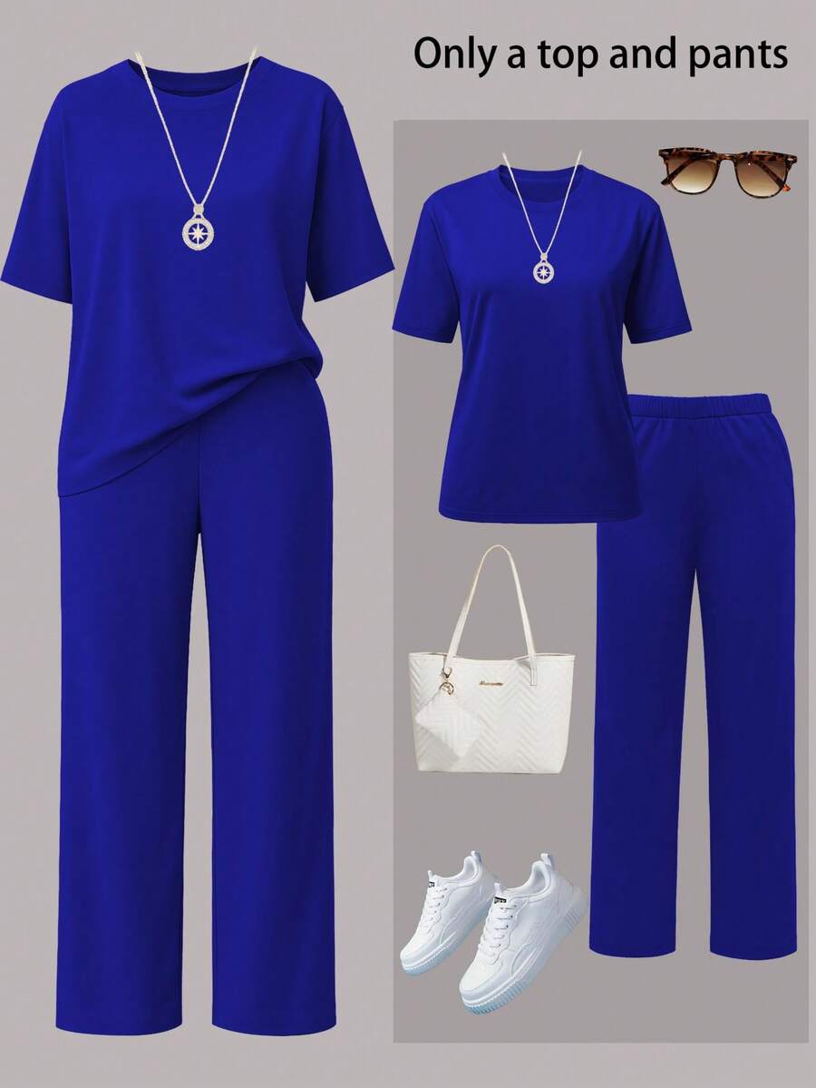 女士休闲纯色圆领短袖上衣搭配松紧腰带口袋阔腿直筒裤两件套，轻薄不透涤纶面料，适合春夏秋季穿着。