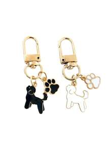 1个狗狗爪印珐琅钥匙扣，可爱的锌合金宠物吊坠，饰有黑色和金色狗狗剪影，非常适合挂钥匙、包包和汽车配件。包包吊坠，俏皮的爪印，闪亮的表面，小狗配饰，是爱狗人士的理想礼物，也是送给朋友的礼物
