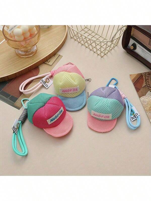 The New Mixed-Color Mesh Bag Travel Storage Hat Is Universal For Loose Change And Coin Bags, Earphone Cases, And Keychain Pendants. It Is A Lightweight Storage Bag Suitable For Organizing Small Items During Travel, Trips, And Office Work, And Can Also Be Used As A Pendant Accessory