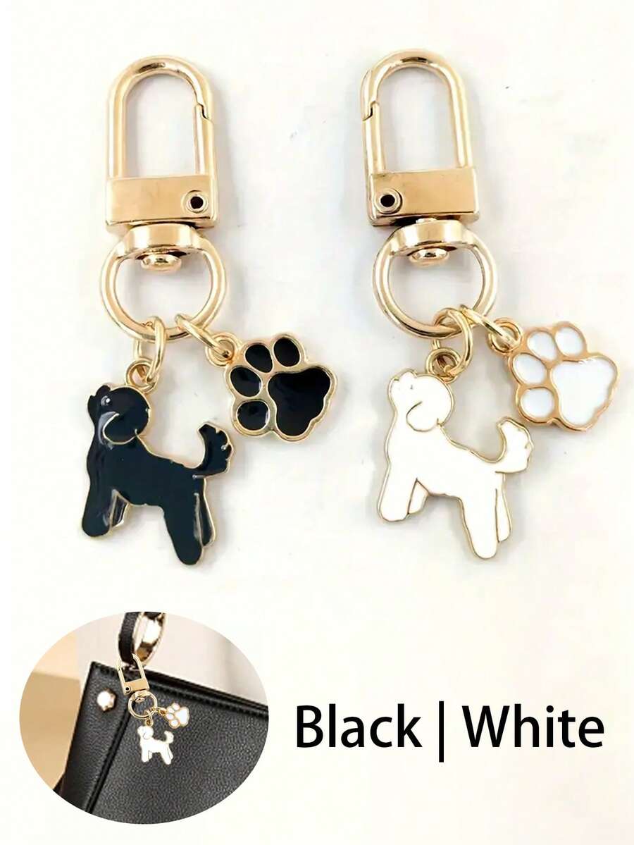 1个狗狗爪印珐琅钥匙扣，可爱的锌合金宠物吊坠，饰有黑色和金色狗狗剪影，非常适合挂钥匙、包包和汽车配件。包包吊坠，俏皮的爪印，闪亮的表面，小狗配饰，是爱狗人士的理想礼物，也是送给朋友的礼物