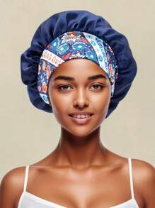 Un ampio cappello da notte con fascia elastica stampata, adatto per capelli ricci o lisci, per le signore