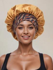 Un ampio cappello da notte con fascia elastica stampata, adatto per capelli ricci o lisci, per le signore