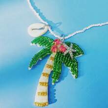 1 pieza Collar de mujer con colgante versátil de estilo clásico con cuentas de cristal de temática oceánica, tela no tejida con árbol de palma, estrella de mar y concha, adecuado para fiestas en la playa, vacaciones y uso diario casual (posición aleatoria de los cristales, cantidad y color aleatorios de perlas en la parte inferior)