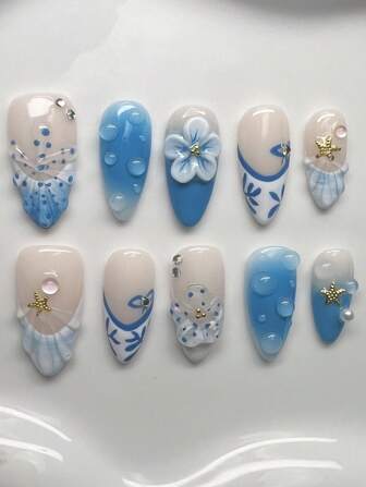 The 10 Piece Set Of Y2K Hot Girl Style Almond Shaped Armor Is Handmade And Comes With A Nude Color Design Featuring Summer Beach Stars, Blue And White French, Wave Glue, Handmade Flower Carving, Sparkling Rhinestones, And Faux Pearl Elements. Both Women And Girls Can Wear Glossy Armor, Suitable For Daily Wear At Parties And Dances, Including A Tool Bag. (Note That Accessory Colors Are Random) Press On Nails Nail Supplies Nails
