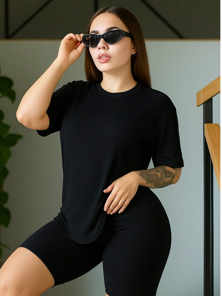1 pieza Camiseta de hombros caídos y 1 pieza Pantalones cortos - Negro - Ver 1