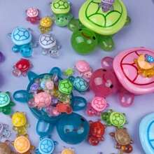 1 صندوق تخزين سلحفاة كبير يضيء في الظلام + 15 سلحفاة صغيرة تضيء في الظلام، 6 قطع و10 قطع سلاحف صغيرة تضيء في الظلام، سلاحف كبيرة تضيء في الظلام، ديكور حوض السمك من الراتنج، تمثال سلحفاة مضيء - ديكور حديقة من الراتنج على شكل حيوان صغير - لا يحتاج إلى كهرباء أو بطارية، ديكور خارجي، نموذج بلاستيكي مضيء يدوي الصنع، مناسب لل- DIY وفن الأظافر وديكور المنزل | تمثال حيوان مثير للاهتمام | ديكور السلاحف