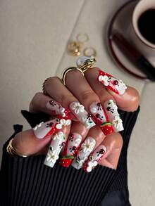 NAIO 纯手工制作的矩形按压式人造指甲，含红色法式指甲贴，饰有3D浮雕花朵和瓢虫图案，春夏美甲套装，专为女士和女孩设计的美甲用品，每套10件，适合返校、派对、庆典和日常佩戴。包含美甲工具，是送给女士和女孩的绝佳礼物。 - 彩色 - 查看 5