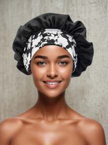 Un ampio cappello da notte con fascia elastica stampata, adatto per capelli ricci o lisci, per le signore