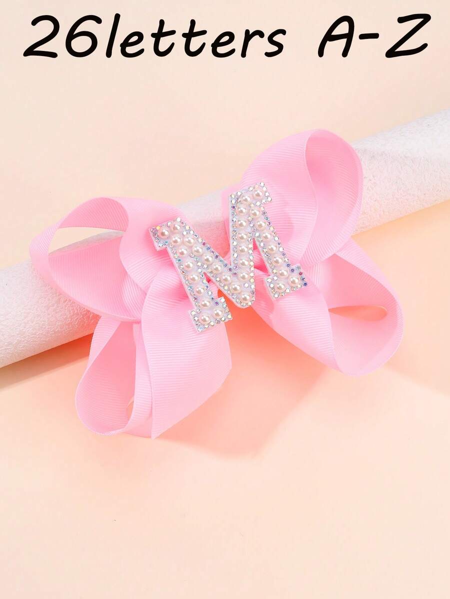 1 pieza Clips para el cabello con moños y letras del abecedario de color rosa para niñas, clips de pelo con lazo y decoración de perlas en forma de letras, accesorios de moda con pinzas de cocodrilo para regalos de fiesta y uso diario - Rosa - Ver 1