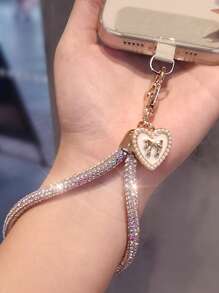 Brazalete tipo cadena de lujo con colgante de lazo y corazón con diamantes de imitación para teléfono móvil