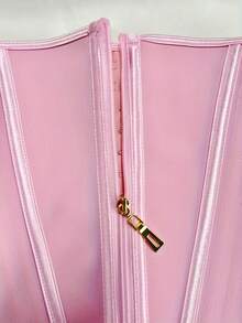 Cinta modeladora feminina de cintura com zíper e botões de pressão, feita de látex.