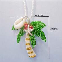 1 pieza Collar de mujer con colgante versátil de estilo clásico con cuentas de cristal de temática oceánica, tela no tejida con árbol de palma, estrella de mar y concha, adecuado para fiestas en la playa, vacaciones y uso diario casual (posición aleatoria de los cristales, cantidad y color aleatorios de perlas en la parte inferior)