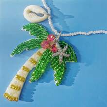 1 pieza Collar de mujer con colgante versátil de estilo clásico con cuentas de cristal de temática oceánica, tela no tejida con árbol de palma, estrella de mar y concha, adecuado para fiestas en la playa, vacaciones y uso diario casual (posición aleatoria de los cristales, cantidad y color aleatorios de perlas en la parte inferior)