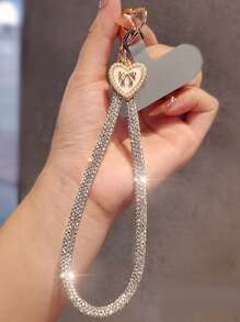 Brazalete tipo cadena de lujo con colgante de lazo y corazón con diamantes de imitación para teléfono móvil