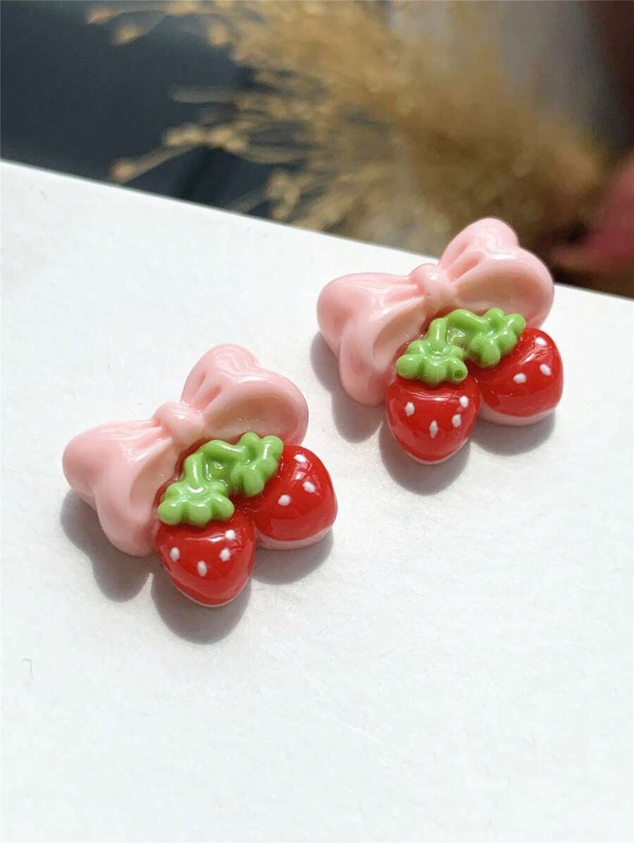 1 pièce Boucles d'oreilles à clous en résine avec nœud papillon et fraise, mignonnes et douces, convenant pour les femmes et les filles pour une utilisation quotidienne