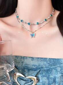 1 pieza Collar con forma de corazón rojo de lujo con perla falsa y diseño de cadena ósea de alta gama para mujeres