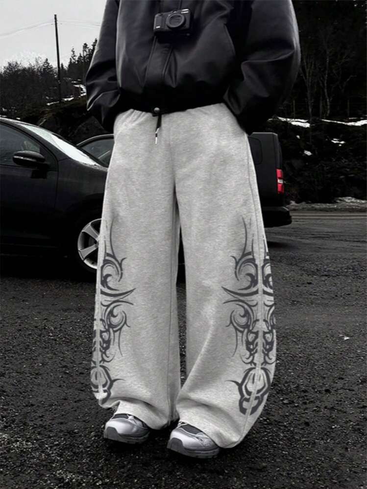 Pantalon de jogging décontracté à imprimé totémique à l'avant et à l'arrière, coupe droite ample dans le style de la rue, graphique graffiti anglais, vêtements de rue confortables
