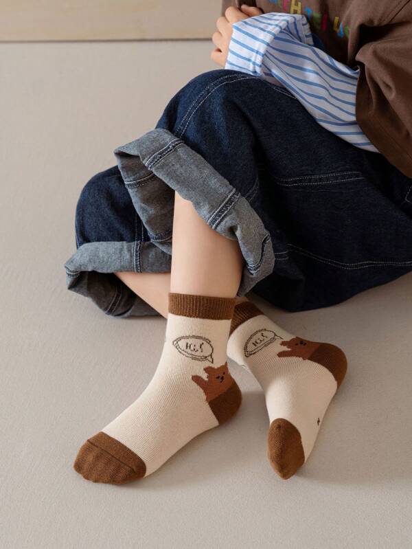 5 Pairs Storytelling Children Socks. 1st Bear Winks, 2nd Holds Speech Bubble, 3rd Steps On Grid Saying "Kuku", 4th Hugs Orange And Spins, 5th Holds "LUCK" And Chases Rainbow~Beige Tone Is Whitening And Stylish, Moms Will Love It!