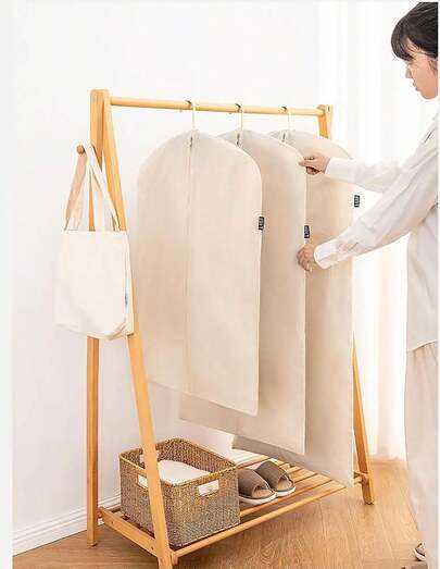 Bolsas colgantes de traje y vestido elegantes y duraderas para viajes, almacenamiento y organización - Perfectas para bodas, viajes de negocios y gestión del guardarropa estacional - Mantenga su ropa sin arrugas y protegida con materiales de alta calidad y ligeros - Ideal para entusiastas de la moda y viajeros frecuentes - Diseño versátil para todas las ocasiones - Accesorio imprescindible para cada armario - ¡Compre ahora para obtener lo mejor en bolsas para prendas esenciales!