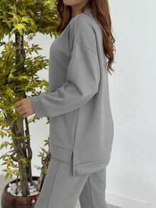 女士休闲纯色简约圆领长袖上衣，搭配女士时尚休闲纯色简约圆领长袖上衣，适合春秋季穿着，轻盈、略带弹性、柔软的涤纶面料。 - 淺灰色 - 查看 3