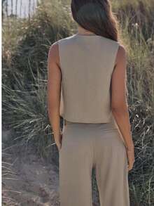 Conjunto de camiseta interior sin mangas con diseño de cuentas de cuello en V y pantalones casuales, estilo europeo y americano para mujer