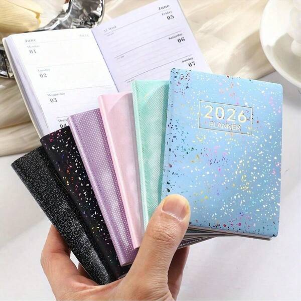 1 pezzo Agenda formato A7 2026 in inglese, copertina a colori con laser, 64 fogli 128 pagine, diario settimanale slim con pianificazione annuale, mensile e giornaliera, cielo stellato, diario mini portatile in formato A7: 10,6 cm x 7,8 cm