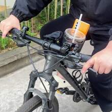 1 pièce Support de tasse double fonction et support de téléphone pour vélo, en ABS haute résistance anti-dérapant et anti-vibration, porte-bidon à dégagement rapide universel adapté au vélo de montagne/vélo électrique/scooter, équipement de fitness et de plein air pour trajet, cadeau de Noël 2025