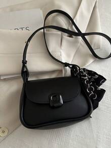 1个复古纯色软边PU马鞍包，迷你磁扣翻盖，可调节肩带，适合女性日常休闲使用