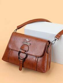 Damen Schultertasche aus PU in Unifarbe mit verstellbarem Trageriemen