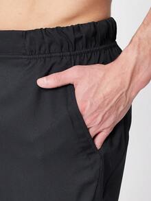 Pantalones cortos de entrenamiento tejidos de 9" de tela elástica para hombres de la marca Nike, de ajuste regular, para baloncesto, fútbol, gimnasio, entrenamiento y correr - Negro - Ver 3